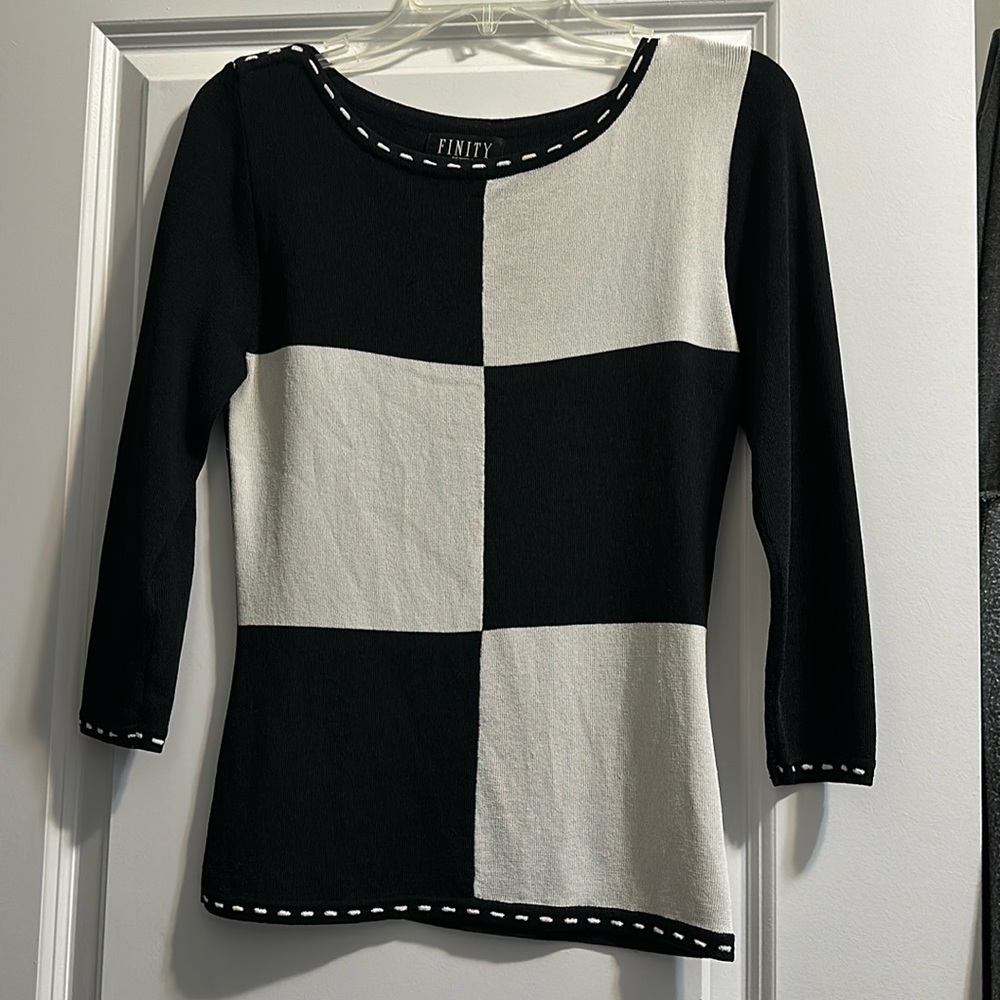 Petite black and white color block sweater